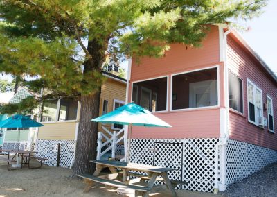 Cottage One exterior with picnic table