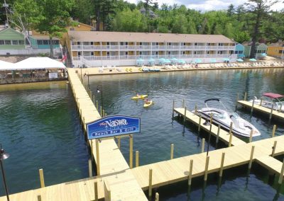 Drone view of the NASWA Resort, docks and Lake Winnipesaukee