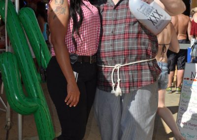 Country girl and hillbilly with moonshine.