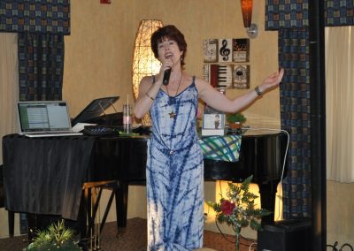 Woman singing karaoke.