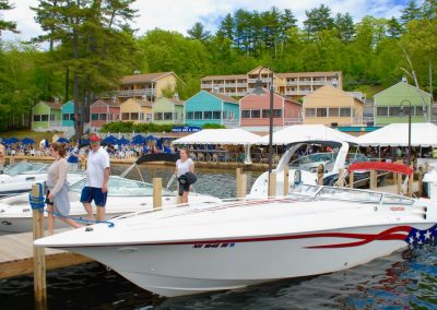 Guests on the docks with speedboats.