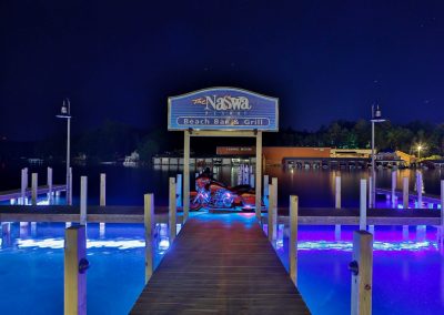 The NASWA Resort docks, cottages and beach at night.