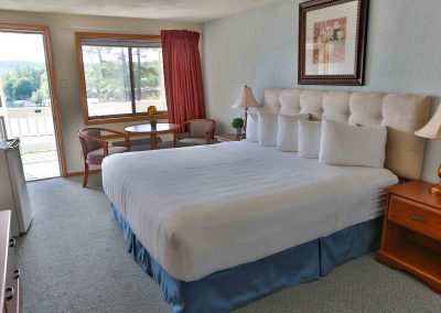 Inn bedroom with king bed.