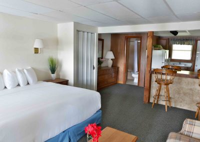 Studio suite with two king bed, kitchen and breakfast bar.