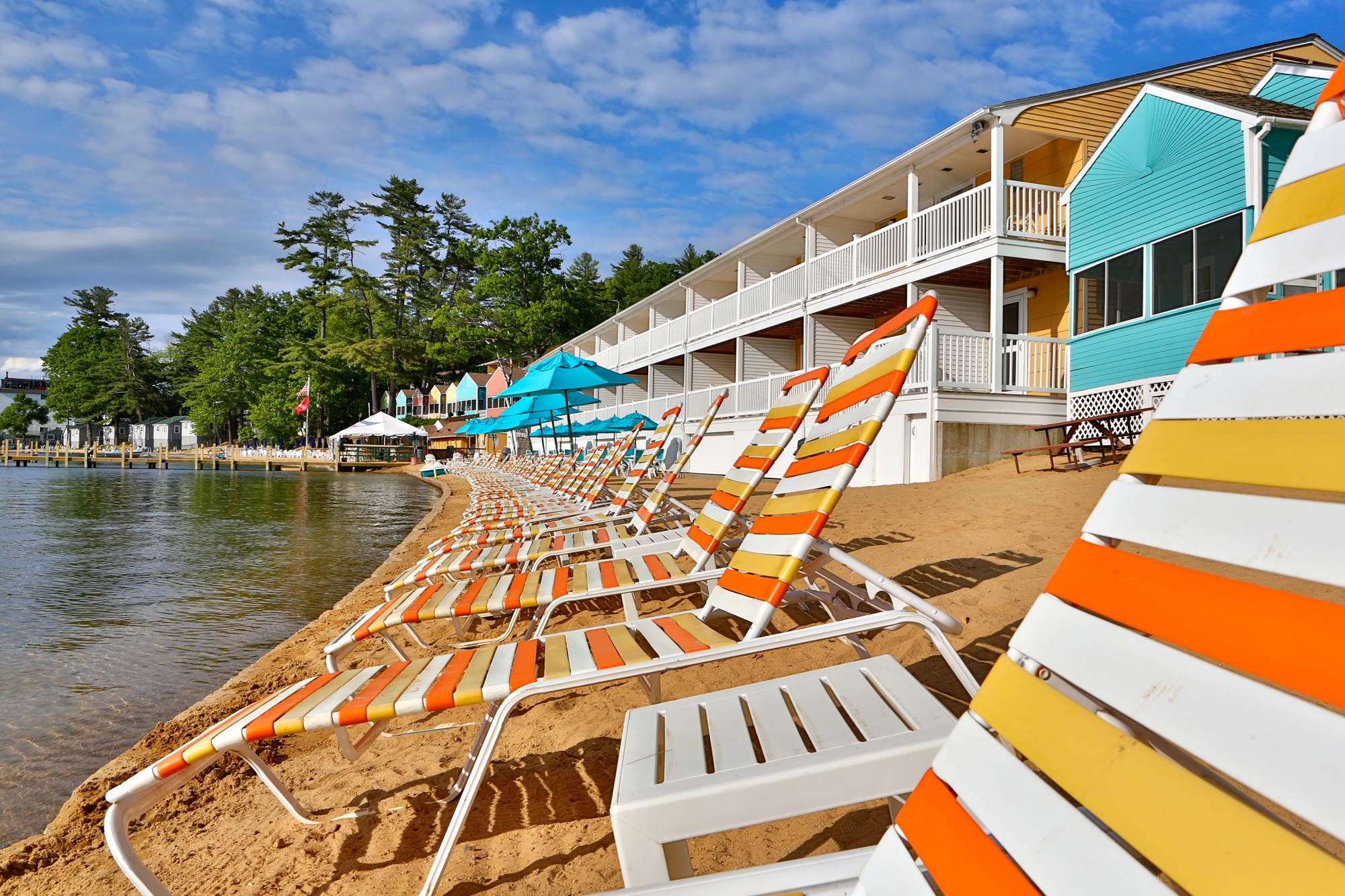 Beach chairs lined up on Lake Winnipesaukee