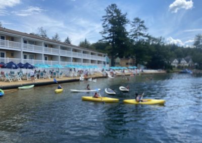 A few kayakers enjoying Lake Winnipesaukee outside of Laconia, NH.